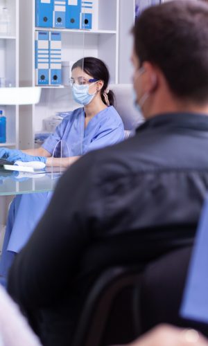 Medical staff working on computer